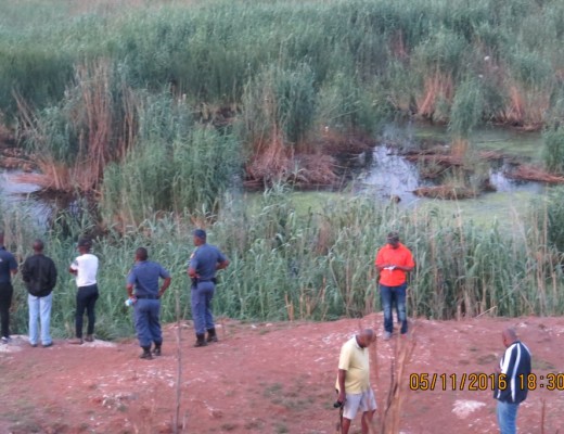 Rescue team looks for a drowned boy